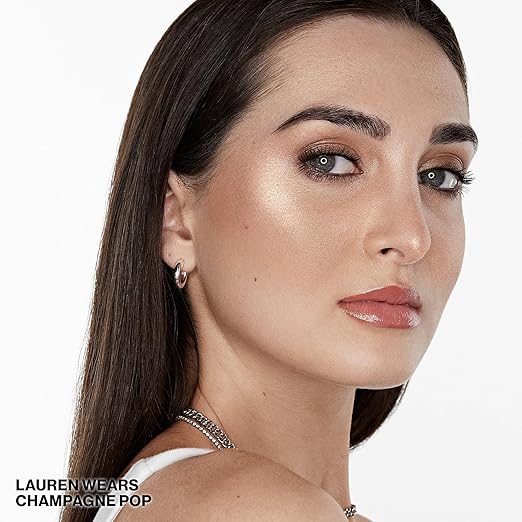 Smashbox x BECCA Skin Perfector Highlighter Champagne Pop shade swatch on skin